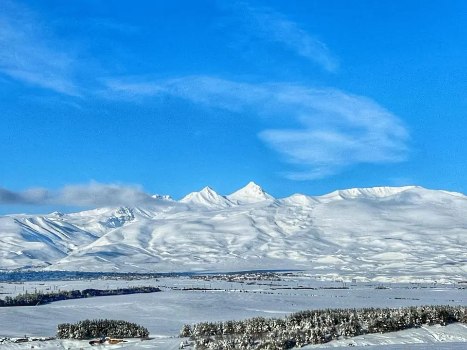 Panorama of Mount Aragats covered in snow
